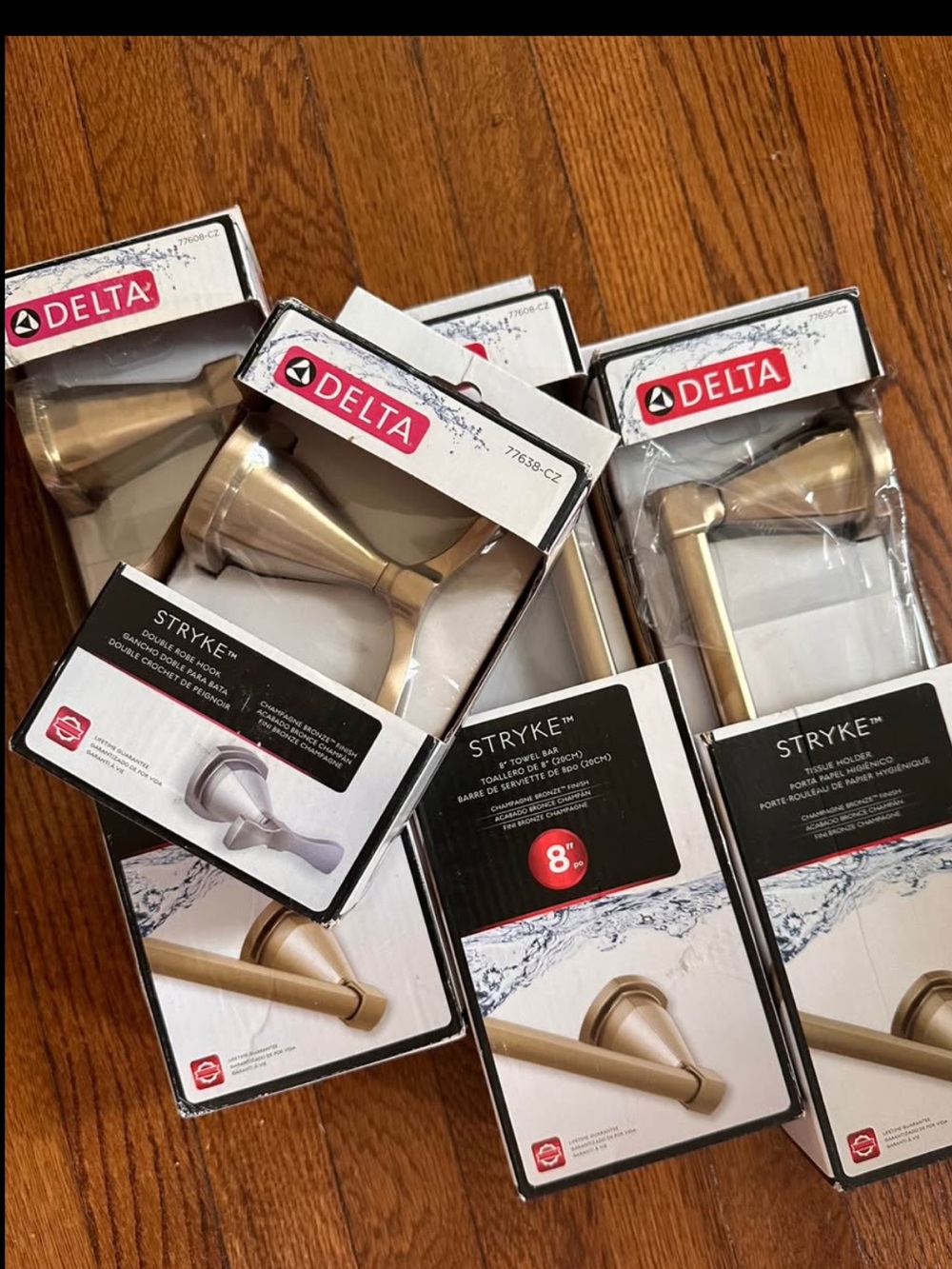 Delta Stryke Bath Hardware Set in champagne bronze